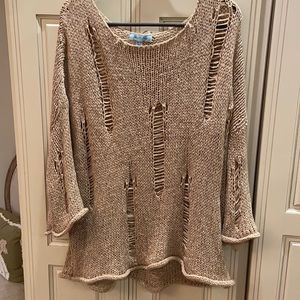 Torn look sweater